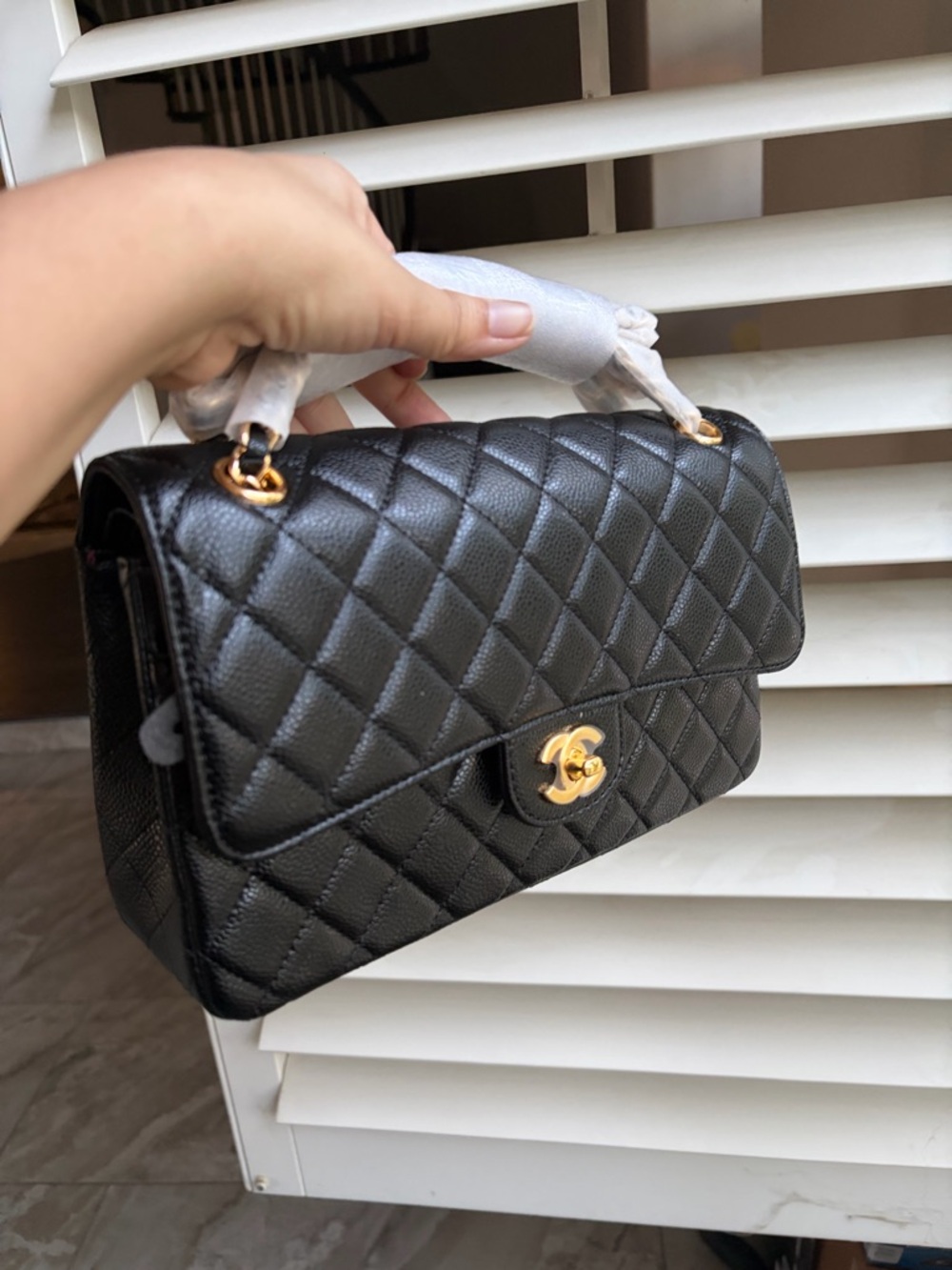 Chanel Black Quilted 
Bag with Gold Chain
GWP/VIP With Dust Bag